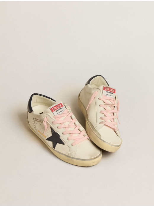 Super-Star LTD with blue leather star and decorative studs