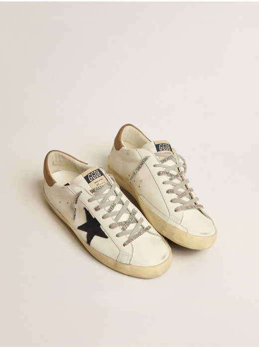 Men's Super-Star in white leather with midnight-blue canvas star and tobacco leather heel tab