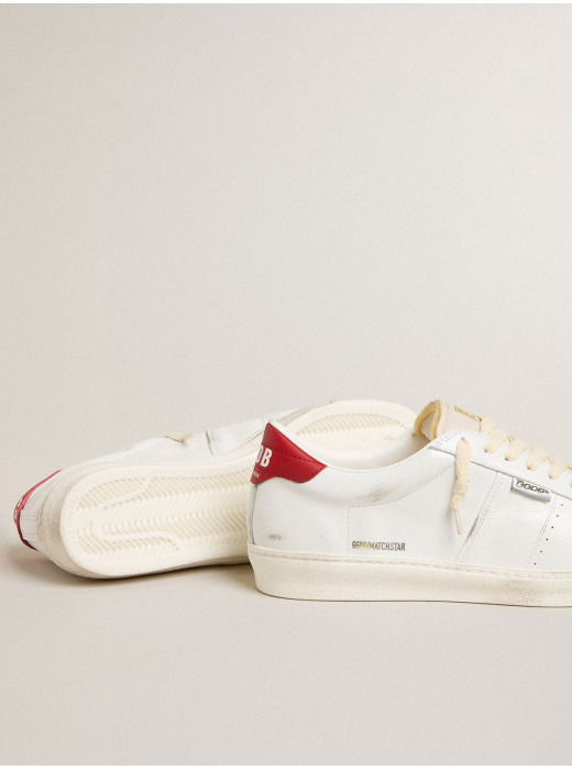 Matchstar in glossy white leather with glossy red leather heel tab