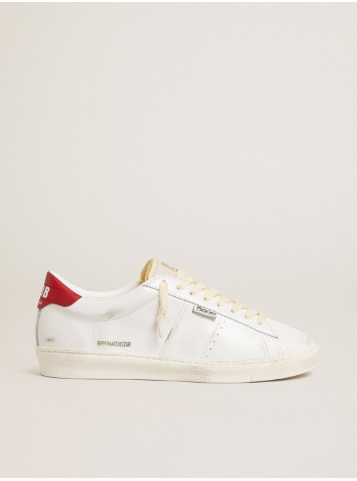 Matchstar in glossy white leather with glossy red leather heel tab