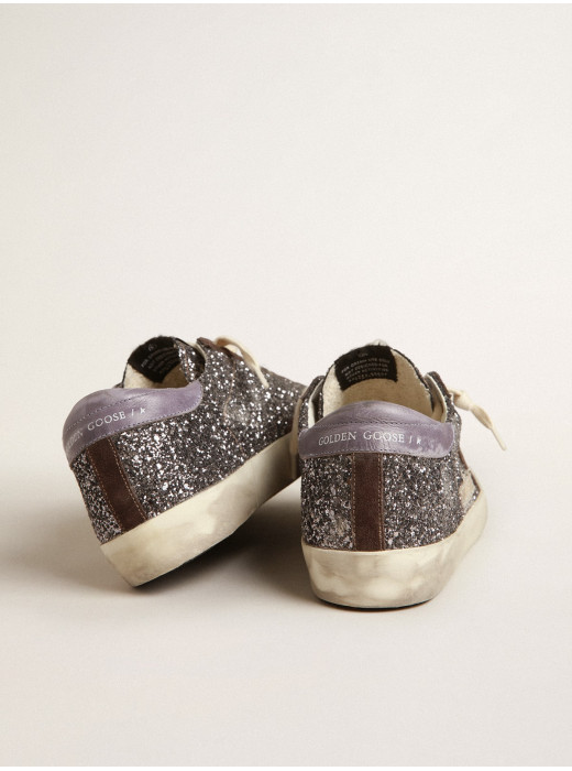 Super-Star in glitter with a brown star and lilac heel tab