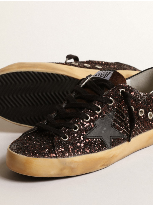 Super-Star in brown glitter with black leather star and heel tab