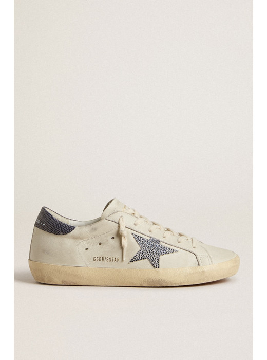 Super-Star LTD with cream-colored leather star with Swarovski crystals and blue leather heel tab with lizard print