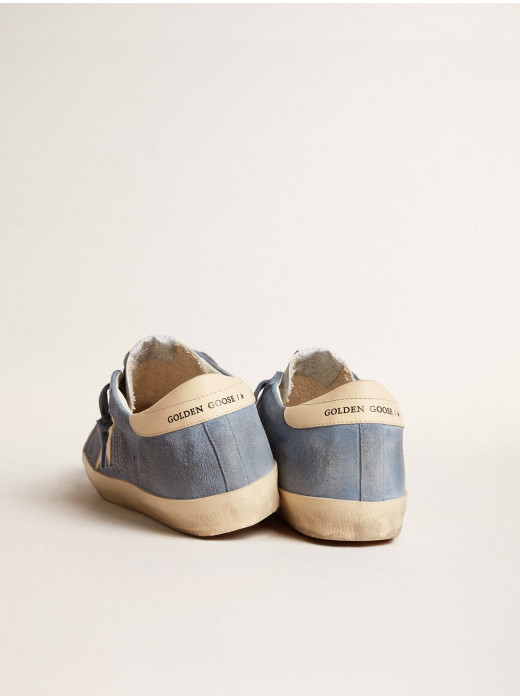 Super-Star in light blue suede with beige leather star and heel tab