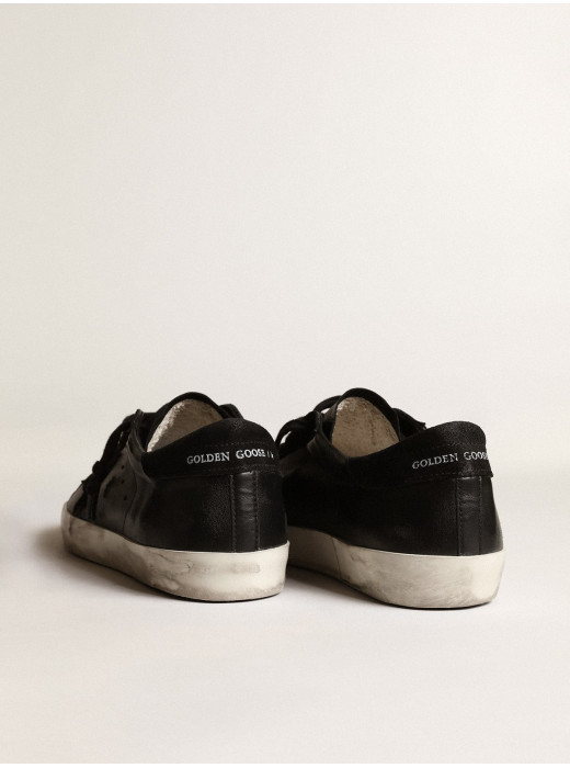 Super-Star in black nappa with black suede star and heel tab