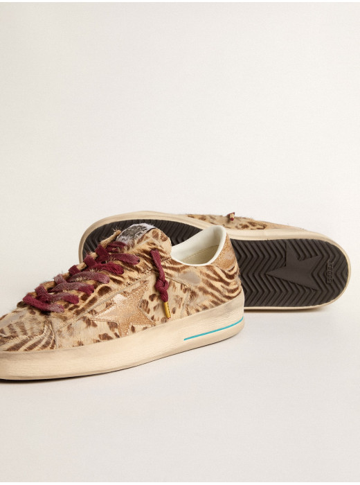 Stardan LTD in animal-print pony skin with gold glitter star