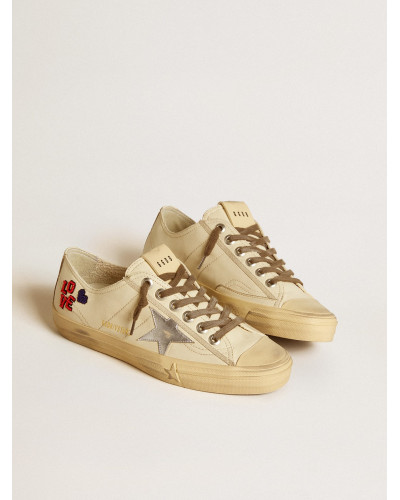 V-Star in ecru nappa with silver nappa star and beaded embroidery