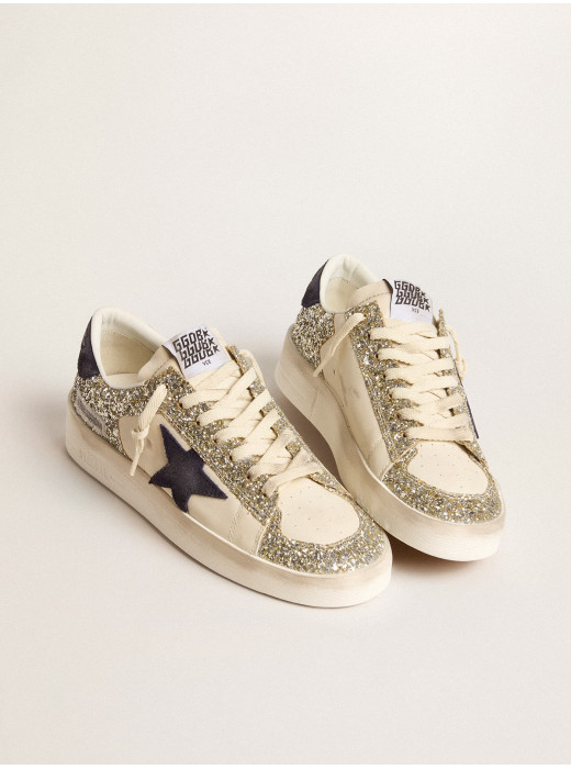 Stardan in platinum glitter with dark blue suede star and heel tab