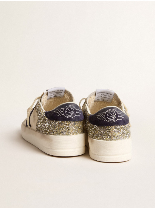 Stardan in platinum glitter with dark blue suede star and heel tab